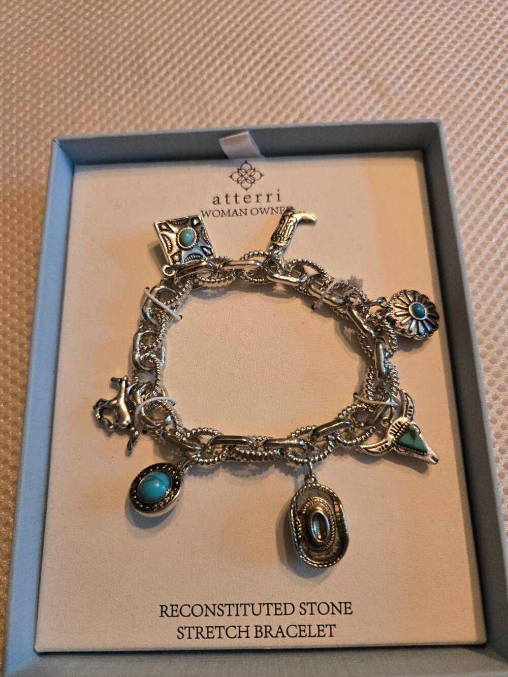 Atterri reconstituted stone stretch silver western theme charm bracelet